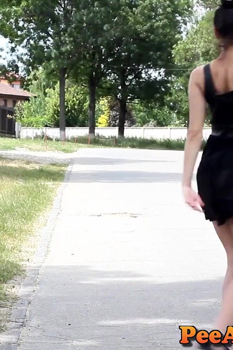 Sexy pee in high heels and a short dress