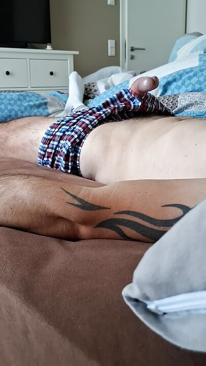 Boy cum with shorts.