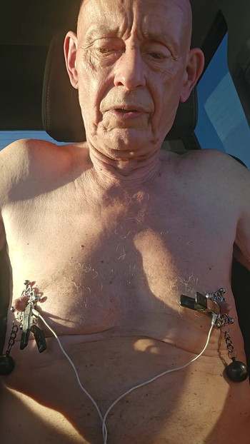 Captivating moment from "nipple torture with spiked clamps and tens unit"
