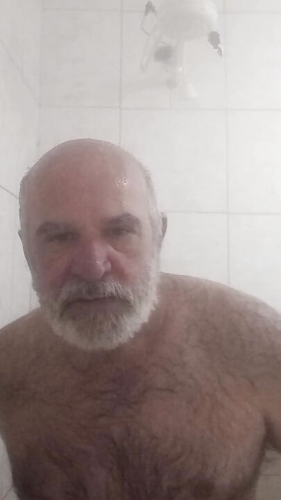 HAIRY BRUTE TAKING A SHOWER