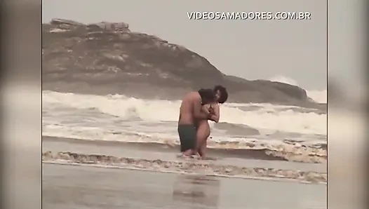 Shameless couple has sex in the shallow sea