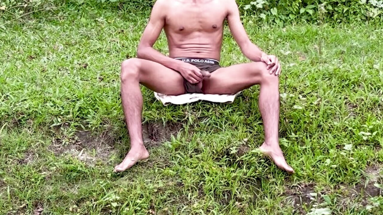 Enjoying alone in jungle Indian young boy