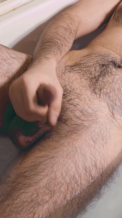 A young guy jerks off in the bath and if he holds back his moans during orgasm. | Clip 2