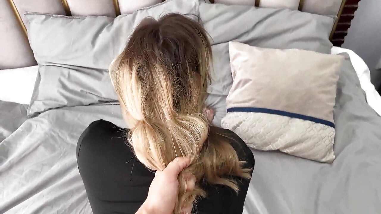 Young blonde in bodysuit in socks beckons me with her ass