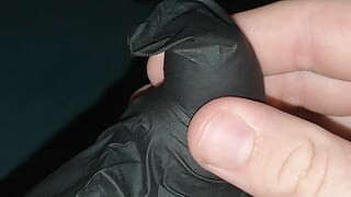Cumming into a latex glove