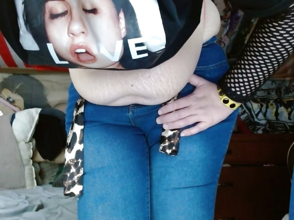 fat sissy with tits wearing and stripping out them tight jeans