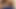 完璧な大きな胸を持つ女の子がストッキングで快感を味わう