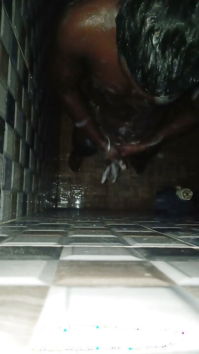Hot Indian man bathing and playing and cleaning his big cock