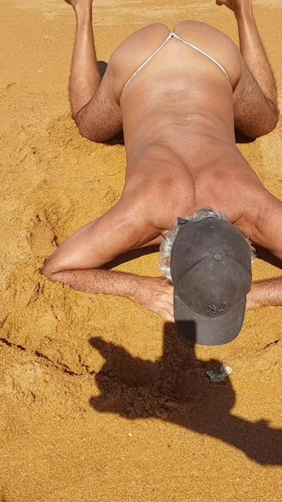 Ladysilva on all fours on the beach