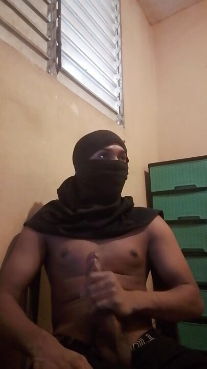 Masked big black cock masturbates