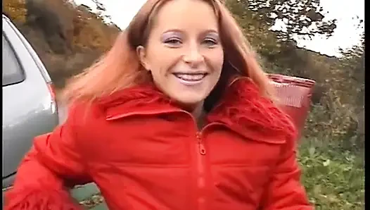 Redhead slut wearing stockings drilling her pussy with banana