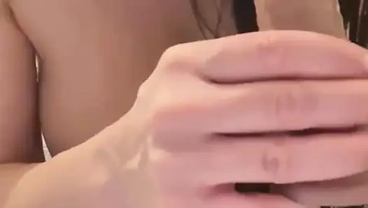 Young stepmom with big tits fucks a dildo in the bathroom