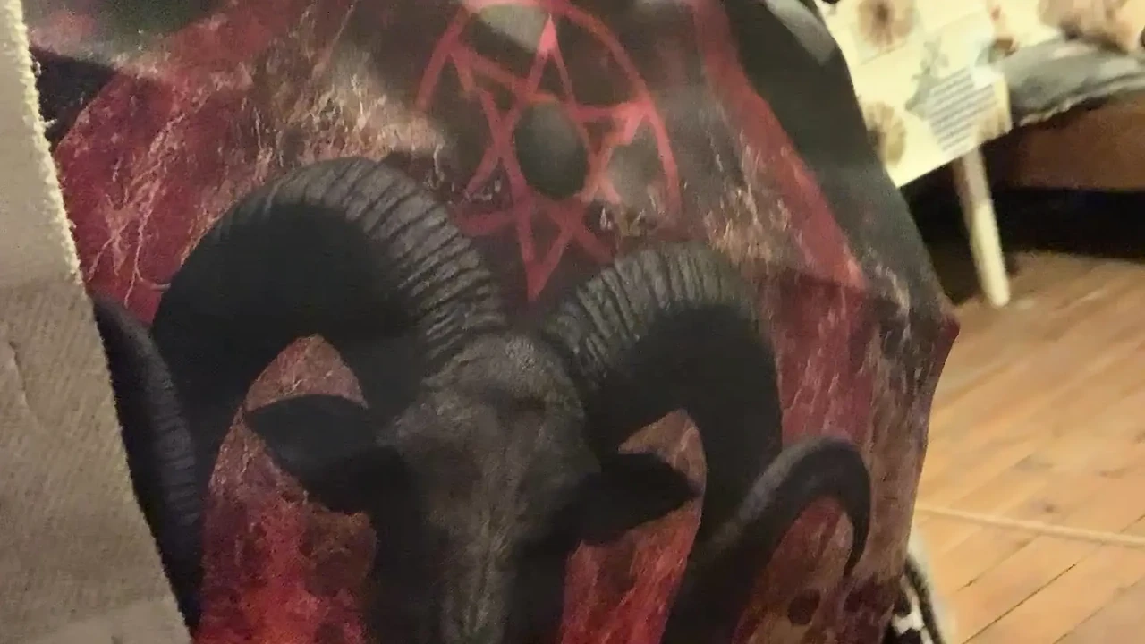 Baphomet slut shows tits