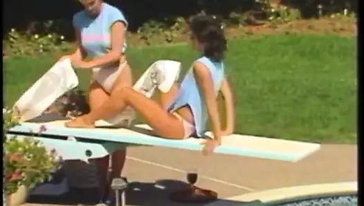 Sexy brunette babe rides her friend's huge strap-on with her tight twat