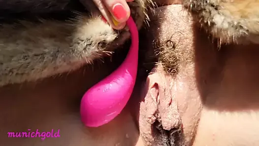 hairy wet butterfly pussy tests her new toy and pisses on the balcony with lust