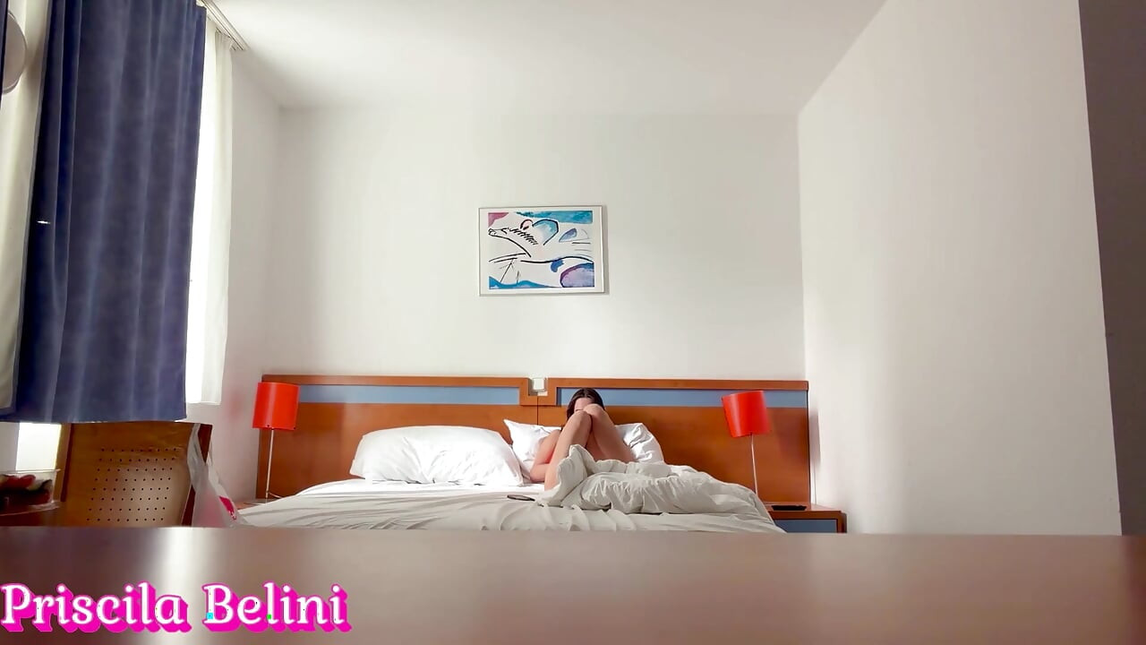 Woman Being Recorded in Hotel Room