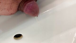 Small penis takes a pee