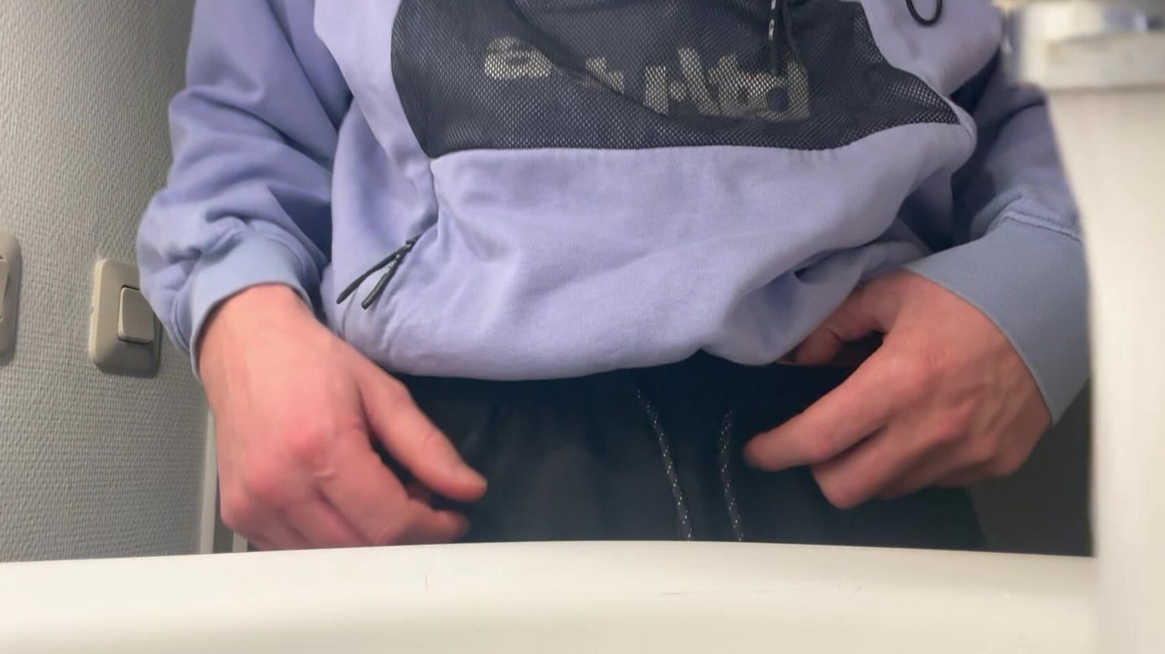 The guy pees in front of the camera, earing the head of his dick. Foreskin.