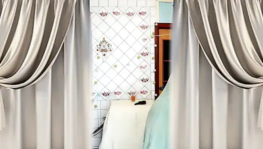 Hot housewife Lukerya with disheveled hair drinks tea and twerks in the kitchen.