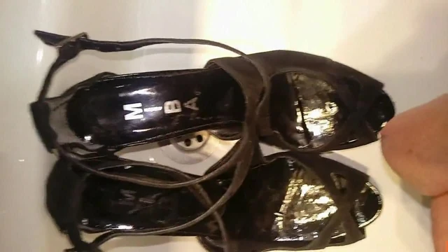 A friend creaming my daugh's black platform sandals with cum