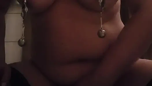 Pain slut: Nipple weights, pussy clamps. Playing with a wand to orgasm.