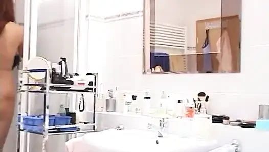 Pretty teen washing her sexy body