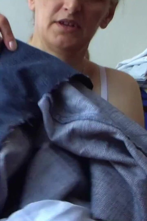 Mature sewing and wearing only bra