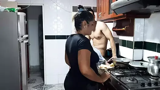 My stepmom gives me a delicious blowjob in the kitchen