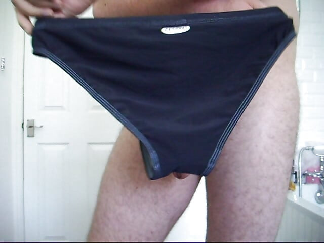 Trying on speedo and adidas swim trunks briefs. Masturbate and cum in speedo then put them on.