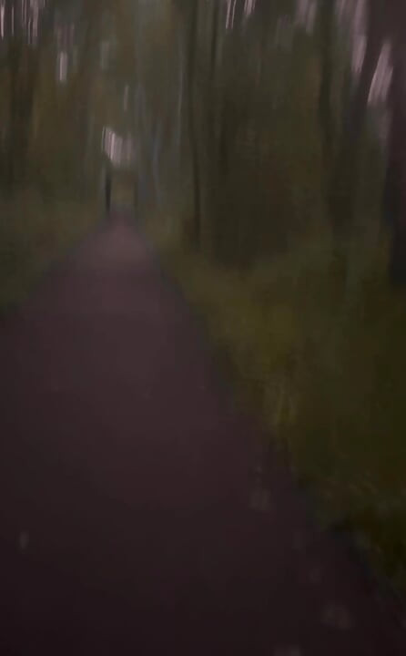 Long naked barefoot walk from car to a welcome to my town sign