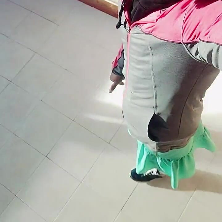 Young Transvestite in a Skirt, the Boy Is Very Cute.