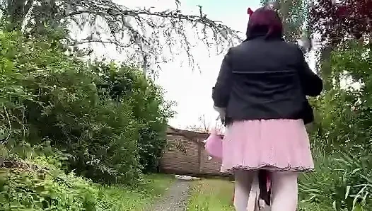 Dressed in a pink polka dot skirt for a party