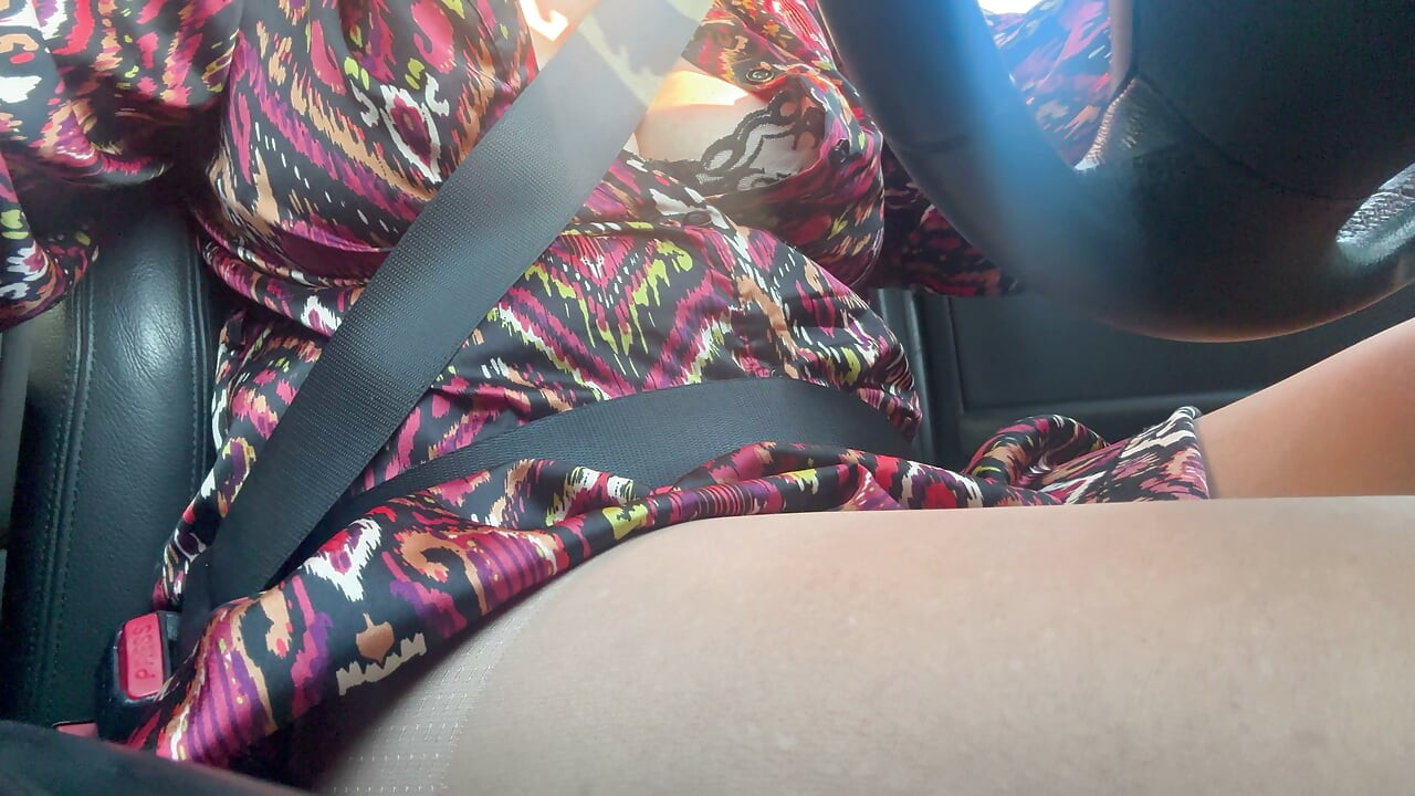 Sexy stepmom drives home and teases us with her big tits, which are practically popping out of her bra.