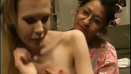 Mature woman strips younger woman naked and plays and licks her twat