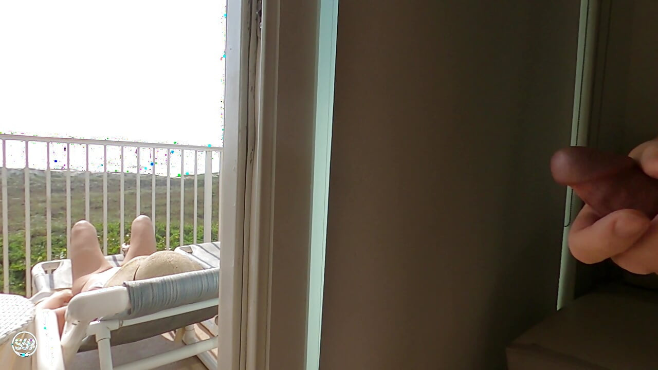 Sunning on the balcony in plain view of everyone walking by