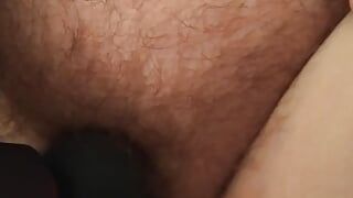 Vibrator working a mature hairy pussy