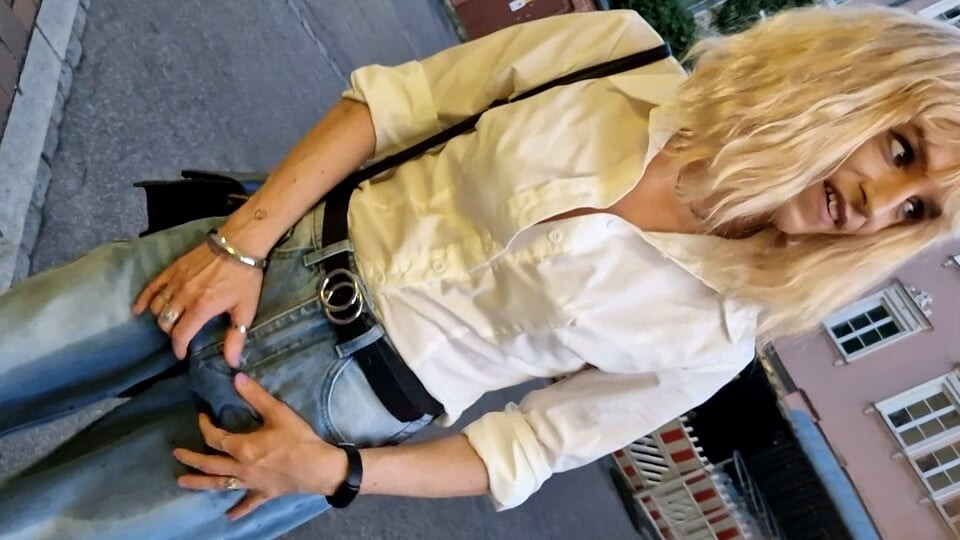 Public wetting in the middle of the city! Tranny walking with wet jeans!