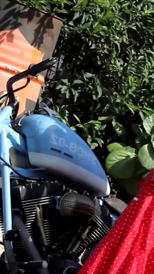 German blonde camgirl dangles her boobs on the motorcycle, and after that she makes a show at EroticOnly! | Clip 1