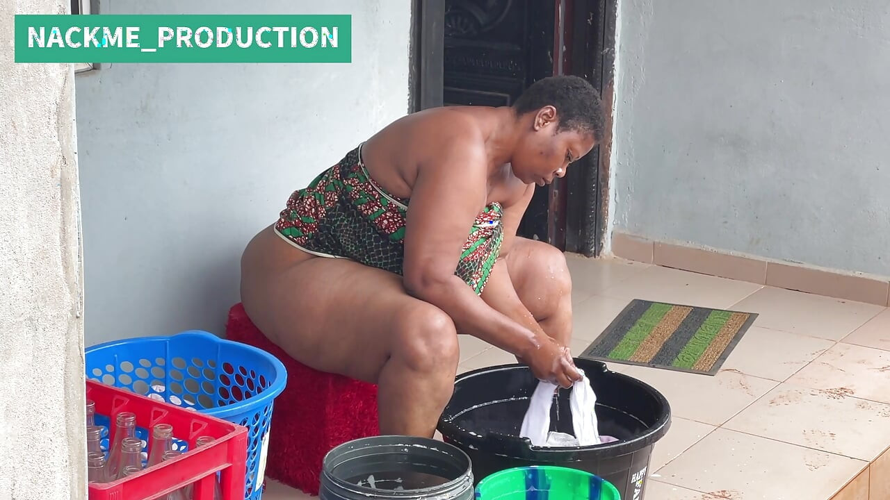 African Mama Multitasks on a Sunday Morning