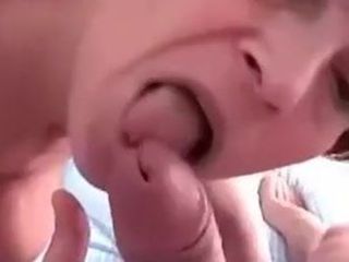 MILF with big tits gives a serious BJ, gets a nice facial.