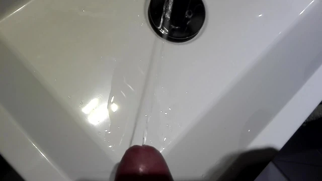 Pissing in a sink