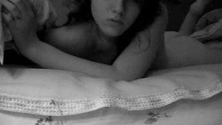 Girl posing in bed