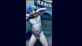 Boy with clown costume gets ready