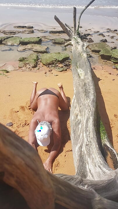 Ladysilva on the beach in panties showing off her big sexy ass
