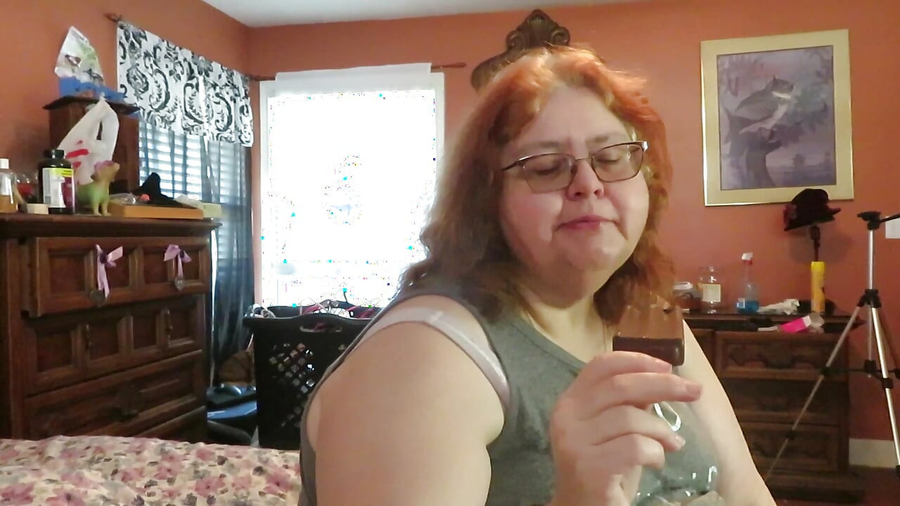 BBW nurse Vicki enjoys eatting a chocolate vanilla ice cream popsiscle