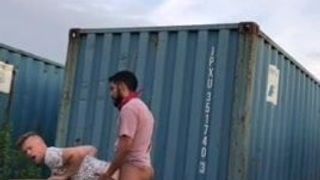 Fucked briefly between the containers