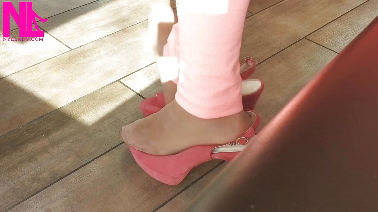Shoeplay with High Heels in a Bar