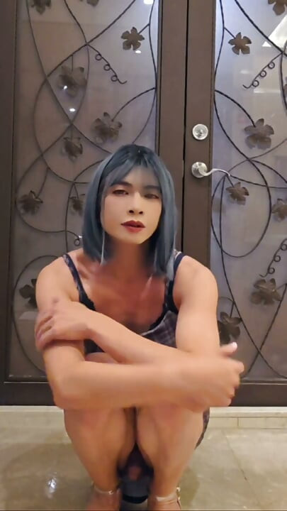 Shemale Ting Xuan Masturbates Anally at the Hotel Entrance.
