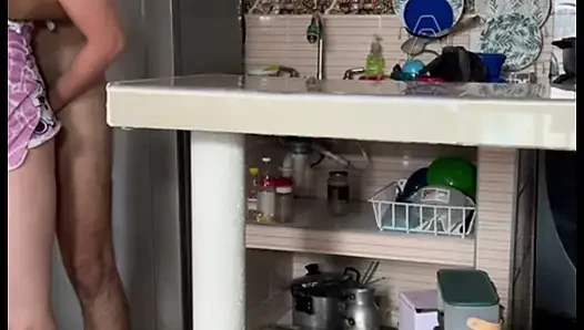 Stepmom masturbates in the kitchen with her huge tits