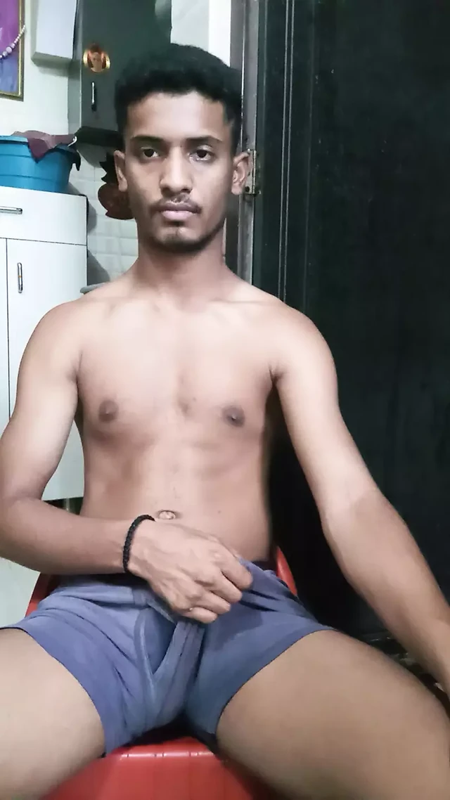 Indian young man massaging big on webcam